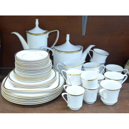 688 - A Spode Golden Eternity dinnerwares and two six-setting tea and coffee sets, teapot a/f