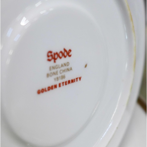 688 - A Spode Golden Eternity dinnerwares and two six-setting tea and coffee sets, teapot a/f