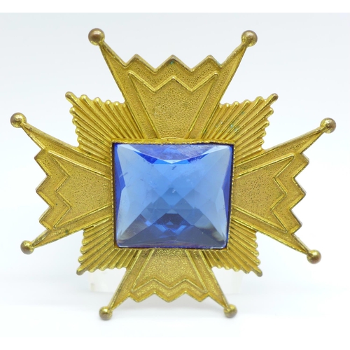 690 - A Miriam Haskell early 1950's brooch in the form of a Maltese cross with large blue paste stone to c... 