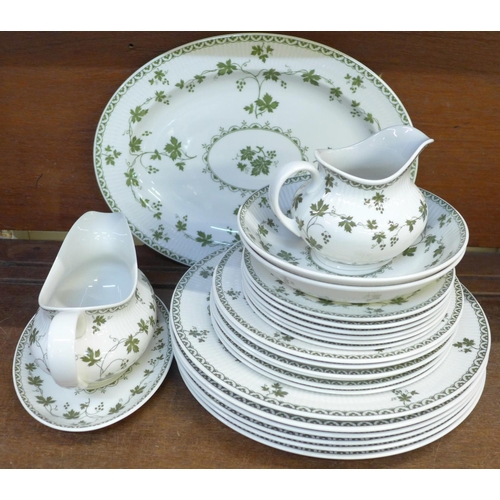 704 - Royal Doulton Greenwich dinnerwares in green, TC1076, comprising six dinner, tea and side plates, tw... 