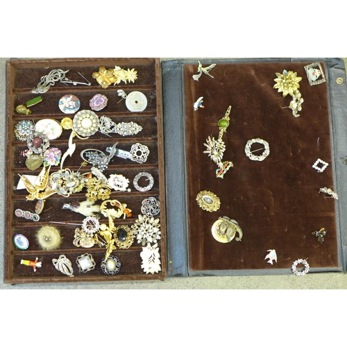 706 - Over 70 costume brooches and pins in case