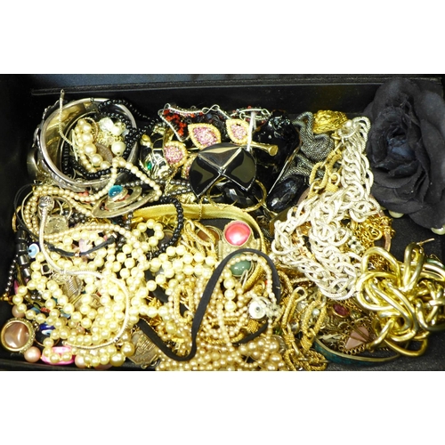 710 - Fashion and costume jewellery in a jewellery box