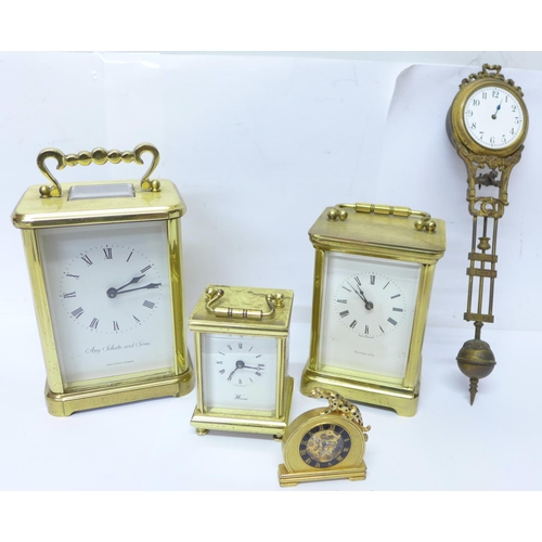 718 - Tiffany & Co, Weiss and Schatz carriage clocks, a pendulum clock and one other clock, a/f