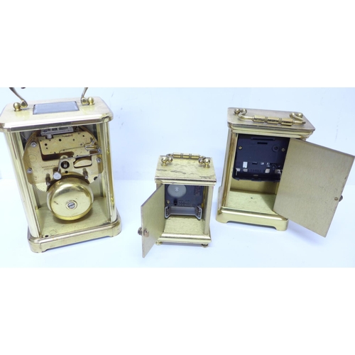 718 - Tiffany & Co, Weiss and Schatz carriage clocks, a pendulum clock and one other clock, a/f