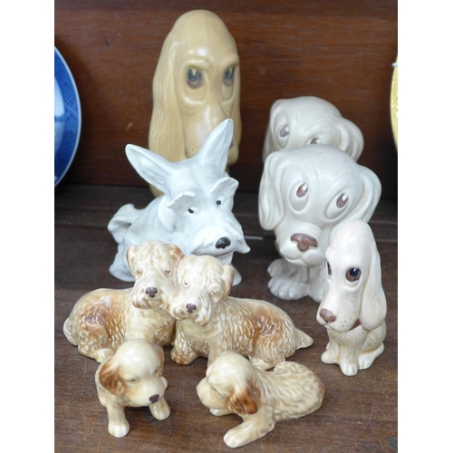 728 - Eight Sylvac dog figures, one a/f