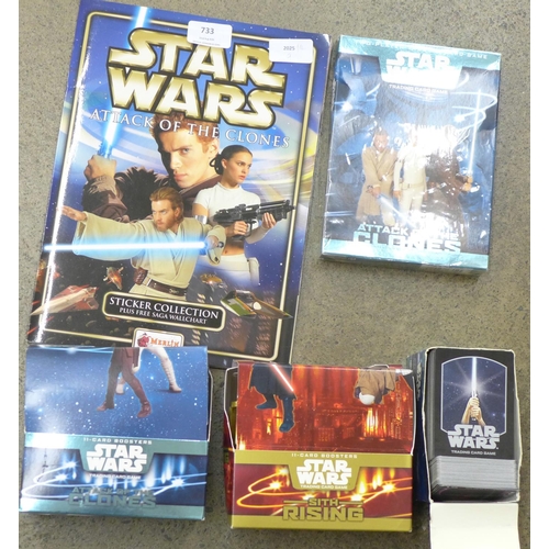 733 - A Star Wars Attack of the Clones sticker collection, a Star Wars trading card box of cards, a Sith R... 