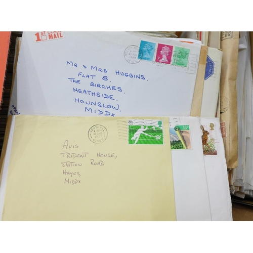 749 - A large collection of used, stamped and addressed envelopes