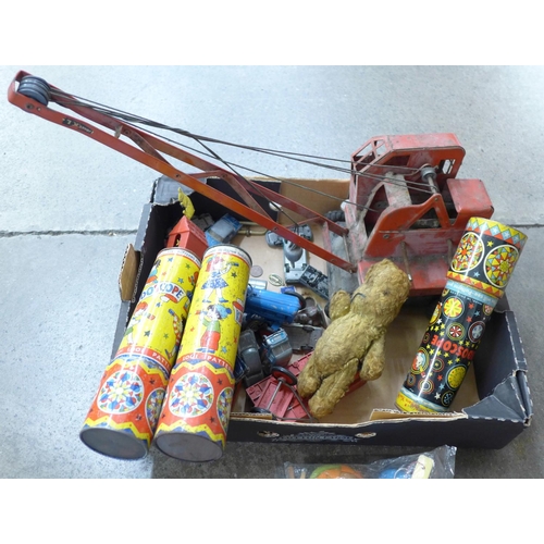 750 - A Jones metal toy crane, die-cast vehicles including Matchbox and three kaleidoscopes