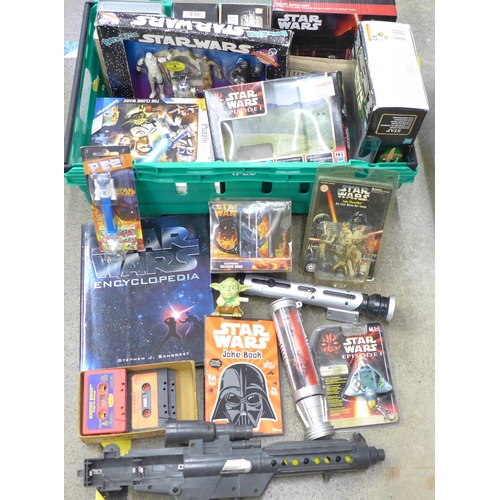 761 - A Star Wars 1978 Stormtrooper toy gun, a Darth Maul watch, a video game, a 1993 Bend-Ems set, casset... 