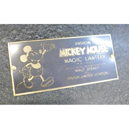 762 - A Mickey Mouse magic lantern, with lantern slides for Mickey Mouse, Peter Pan, Cinderella, Jack and ... 