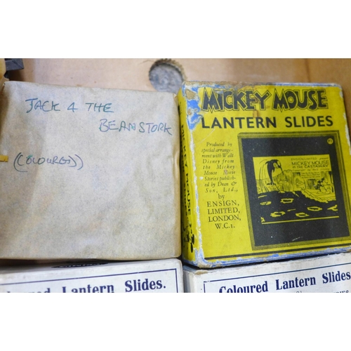 762 - A Mickey Mouse magic lantern, with lantern slides for Mickey Mouse, Peter Pan, Cinderella, Jack and ... 