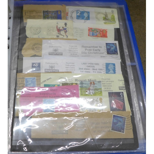 775 - A collection of stamps, used, stamped addressed envelopes, other postal history, two empty folders a... 