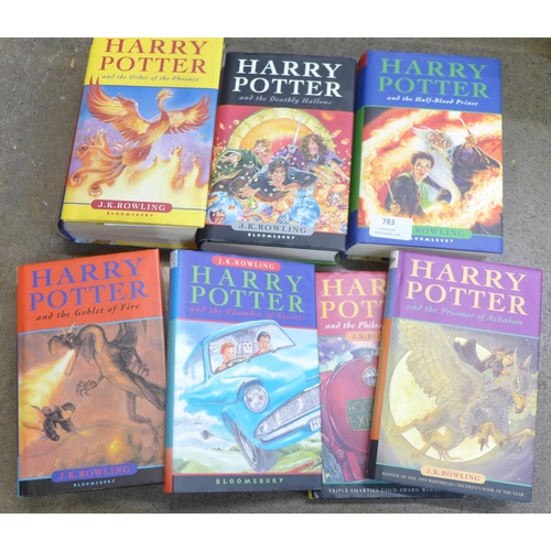 783 - Seven Harry Potter books; three first edition and a set of four later with slipcase