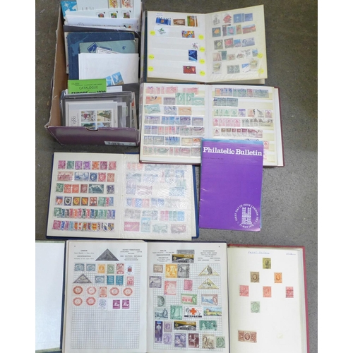 784 - Stamps; a box of albums, covers, catalogues, etc.