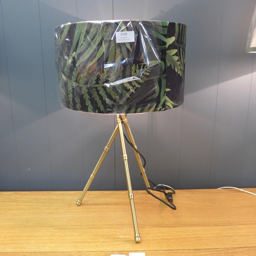 1511 - A bamboo table lamp with a leaf print shade