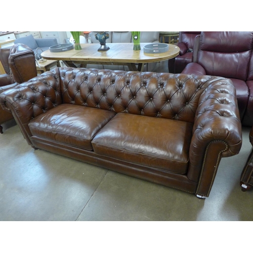 1301 - A Buckingham three seater sofa *this lot is subject to VAT