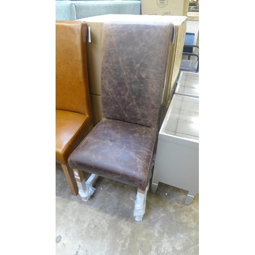 1636 - A brown leather rollback chair