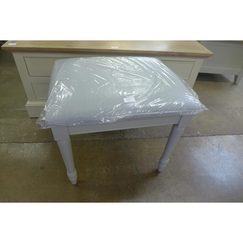 1832 - A grey upholstered stool (ref 44) *this lot is subject to VAT