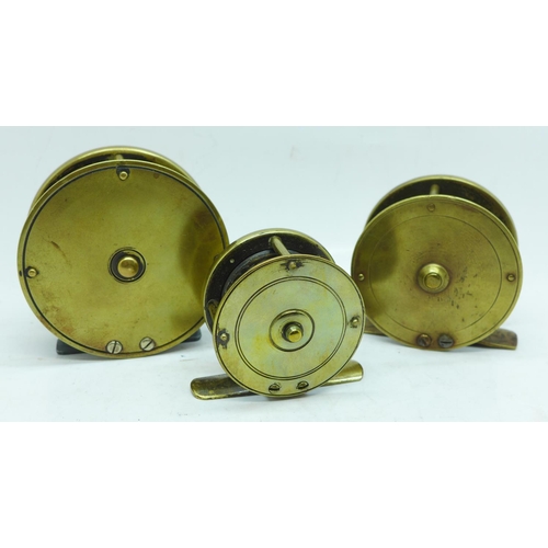 626 - Three brass fishing reels