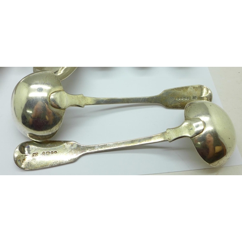 872 - A pair of Victorian silver ladles and six assorted silver spoons including Georgian, 430g