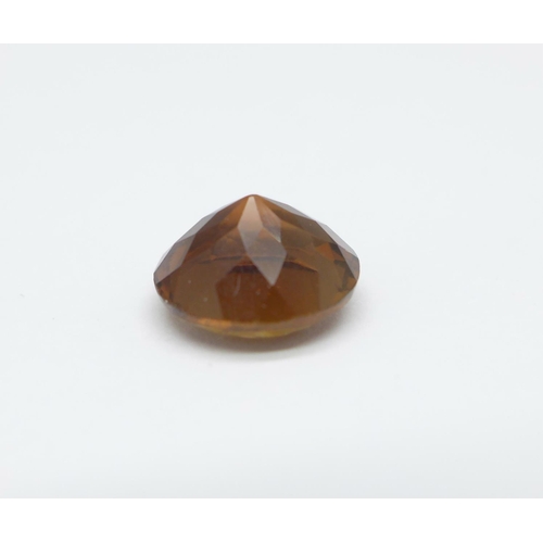 998 - An unmounted orange topaz, approximately 3.4carat weight