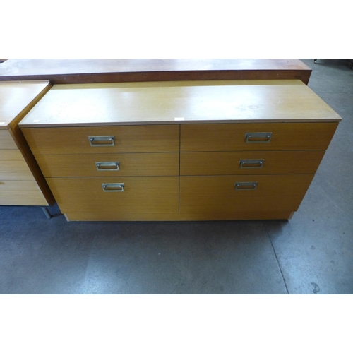 90 - A teak chest of drawers