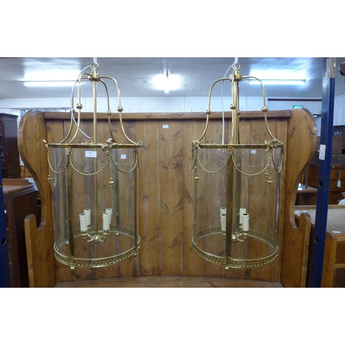 172 - A pair of French style gilt metal cylindrical hanging ceiling lanterns