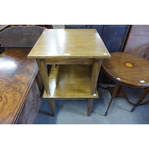 235 - A pair of oak coffee tables