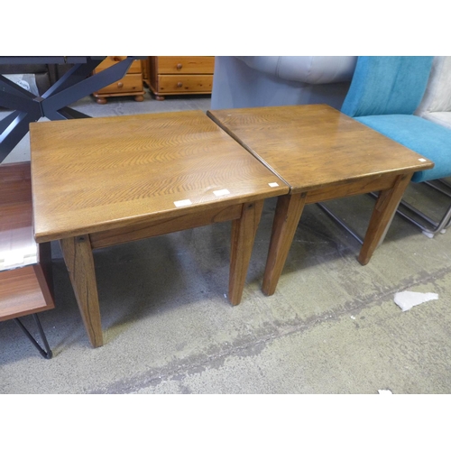 235 - A pair of oak coffee tables