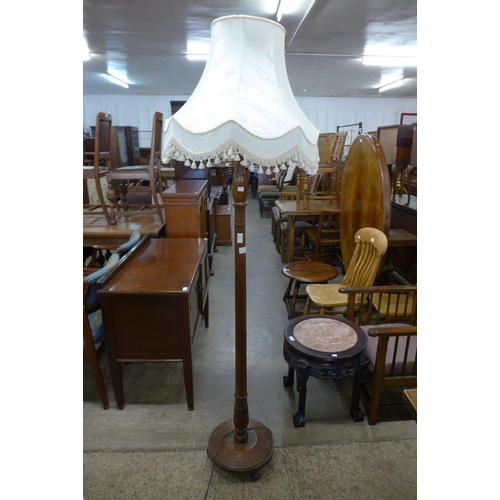 255 - An oak standard lamp