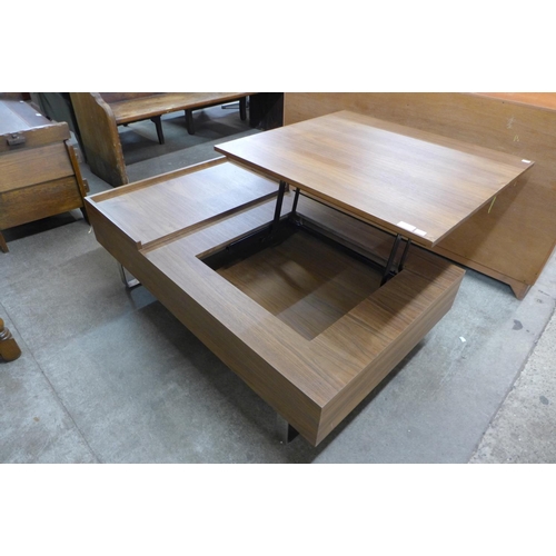 219a - A simulated oak and chrome metamorphic coffee table