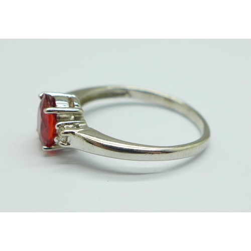 1015 - A 9ct white gold, diamond and red sapphire ring, 2.3g, N