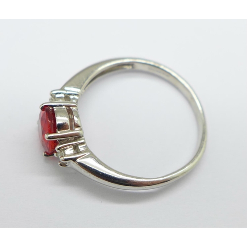 1015 - A 9ct white gold, diamond and red sapphire ring, 2.3g, N