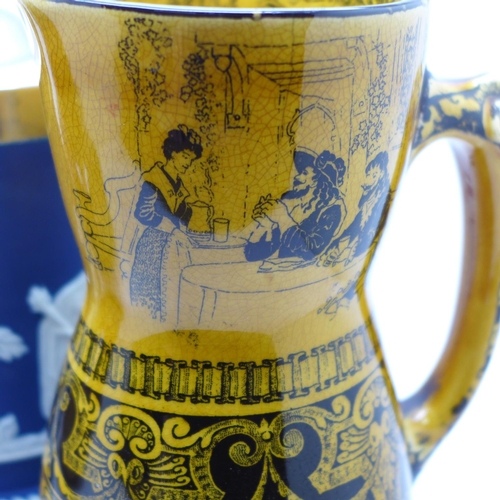 605 - Two Doulton jugs, Jacobean and saltglaze and an Adams jasper biscuit barrel