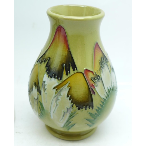 607 - A Moorcroft 20cm jug, second, small chip to the base and 10cm Moorcroft toadstool vase, second