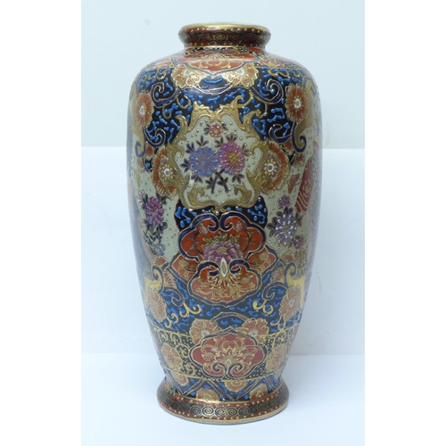 608 - A Chinese vase, hand decorated and outlined in gold, 32cm