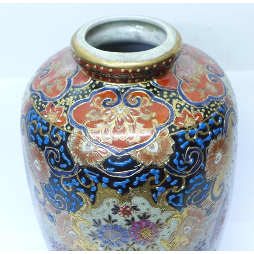 608 - A Chinese vase, hand decorated and outlined in gold, 32cm