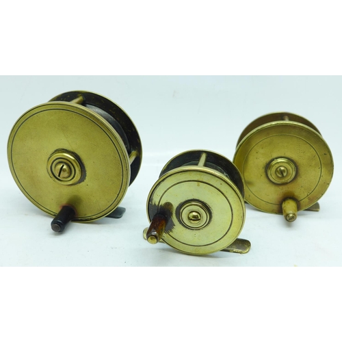 626 - Three brass fishing reels