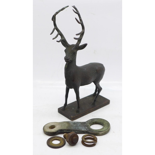 634 - An early 20th Century bronze stag car mascot, 15cm