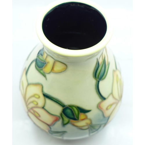 645 - A Moorcroft vase, 13.5cm, dated 1999, first quality