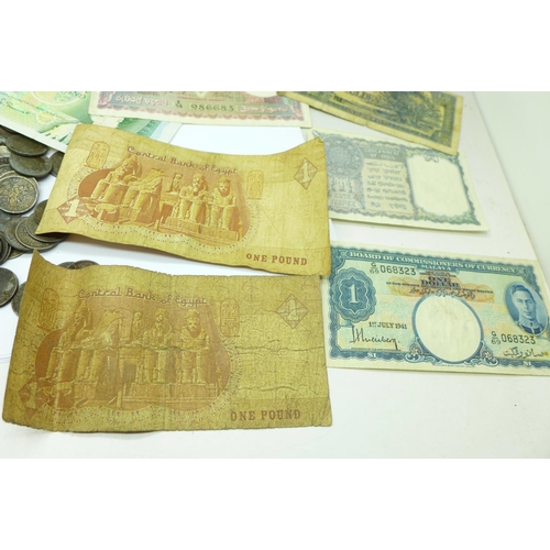 648 - A collection of sixpences and foreign banknotes