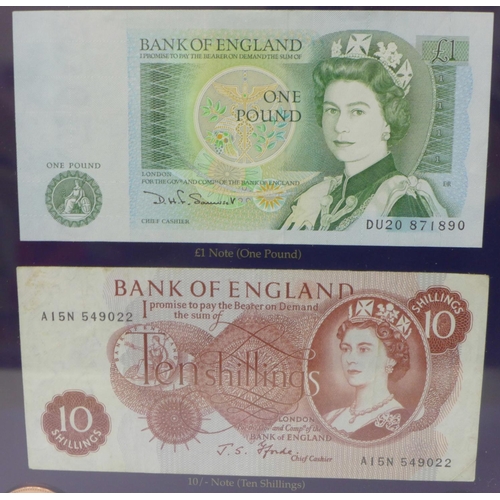 711 - A British Heritage Collection of banknotes and coins including a ten shilling and one pound note, fr... 