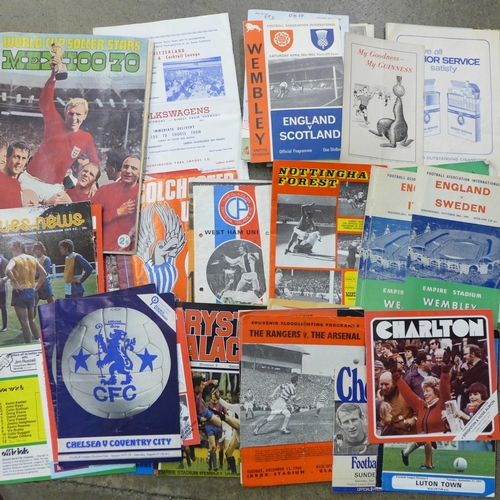 719 - A collection of football programmes and a Mexico 1970 Soccer Stars sticker album