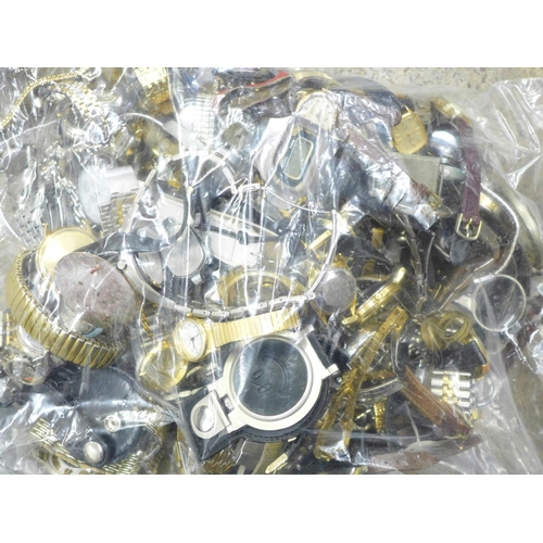 728 - A quantity of wristwatches, cases and dials, etc., a/f