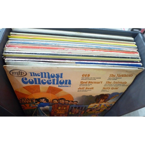 733 - Two cases of LP records including T-Rex, Status Quo and Fleetwood Mac