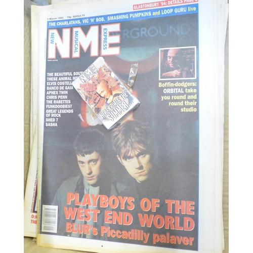 752 - Thirty NME and Melody Maker magazines - some sealed, some with free gifts