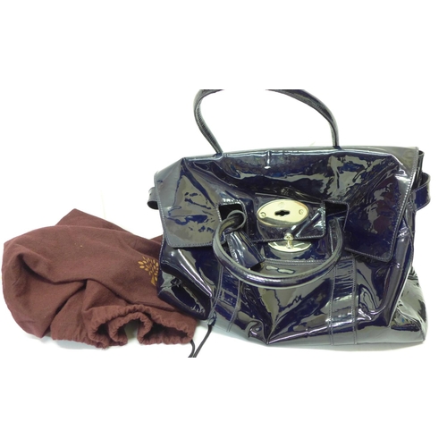 770 - A Mulberry patent navy handbag and dust bag