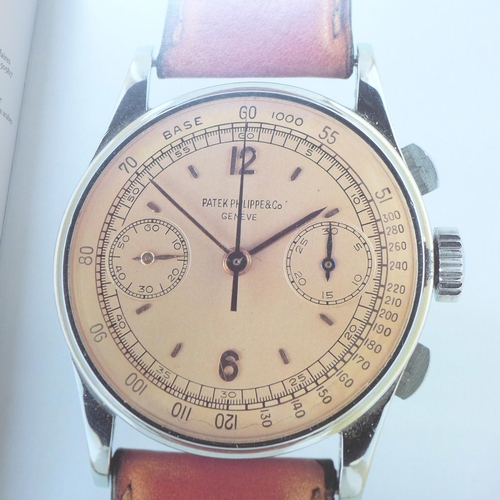 783 - A collection of watch books including Watches International and Patek Phillippe