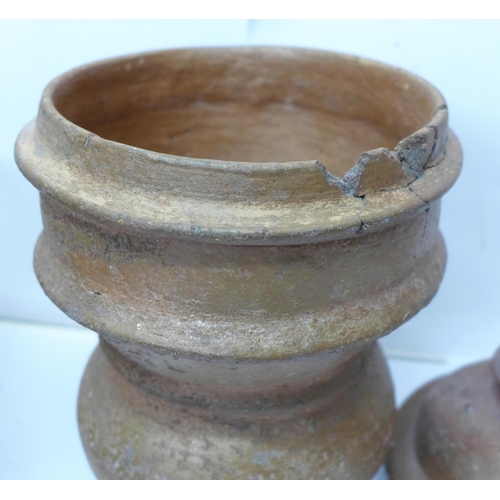 795 - A large mortar and a lidded unglazed jar, possibly for steaming rice