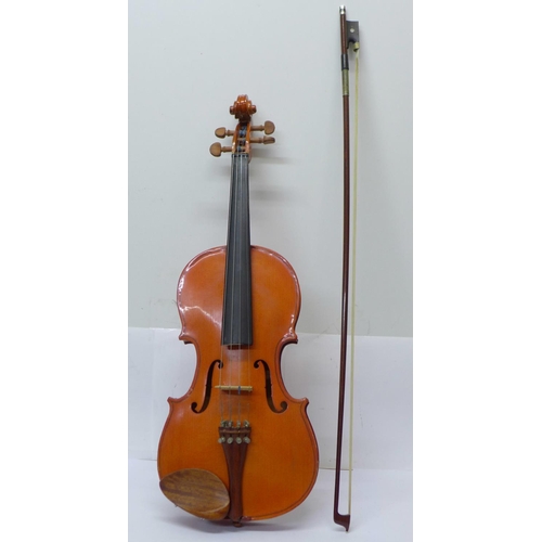 814 - A cased Stentor Student violin, 36cm back